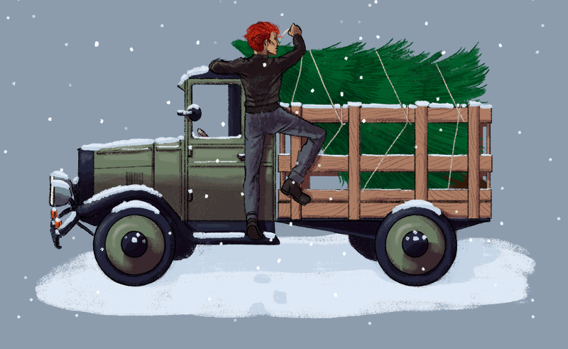 A man securing a Christmas tree to the bed of his 1930s pickup truck